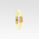 B gold and rubber bracelet