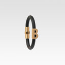 B gold and rubber bracelet