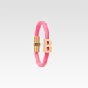 B gold and rubber bracelet