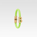 B gold and rubber bracelet